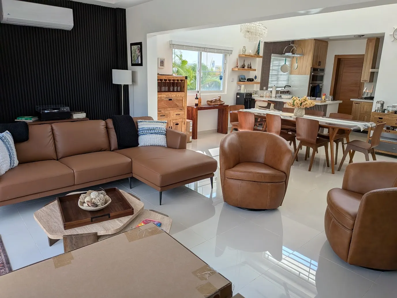 The open living room with leather seating